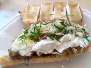 Venison Tenderloin, homemade sauerkraut, Brie, fresh herbs, garlic toum