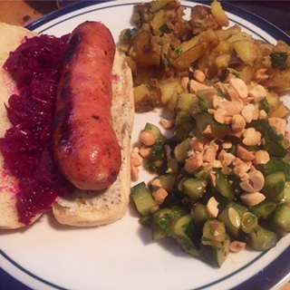 Brat with beet sauerkraut, turmeric/garlic roast potatoes, Asian cucumber salad with peanuts