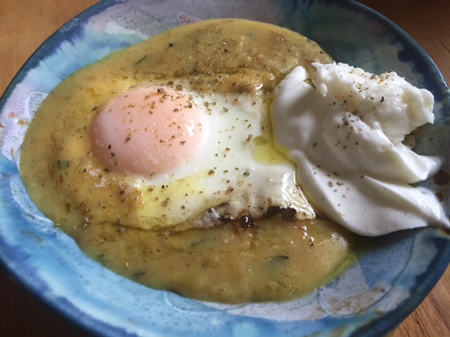 Creamy potato soup topped with over easy egg and a dollop of Greek yogurt/garlic toum