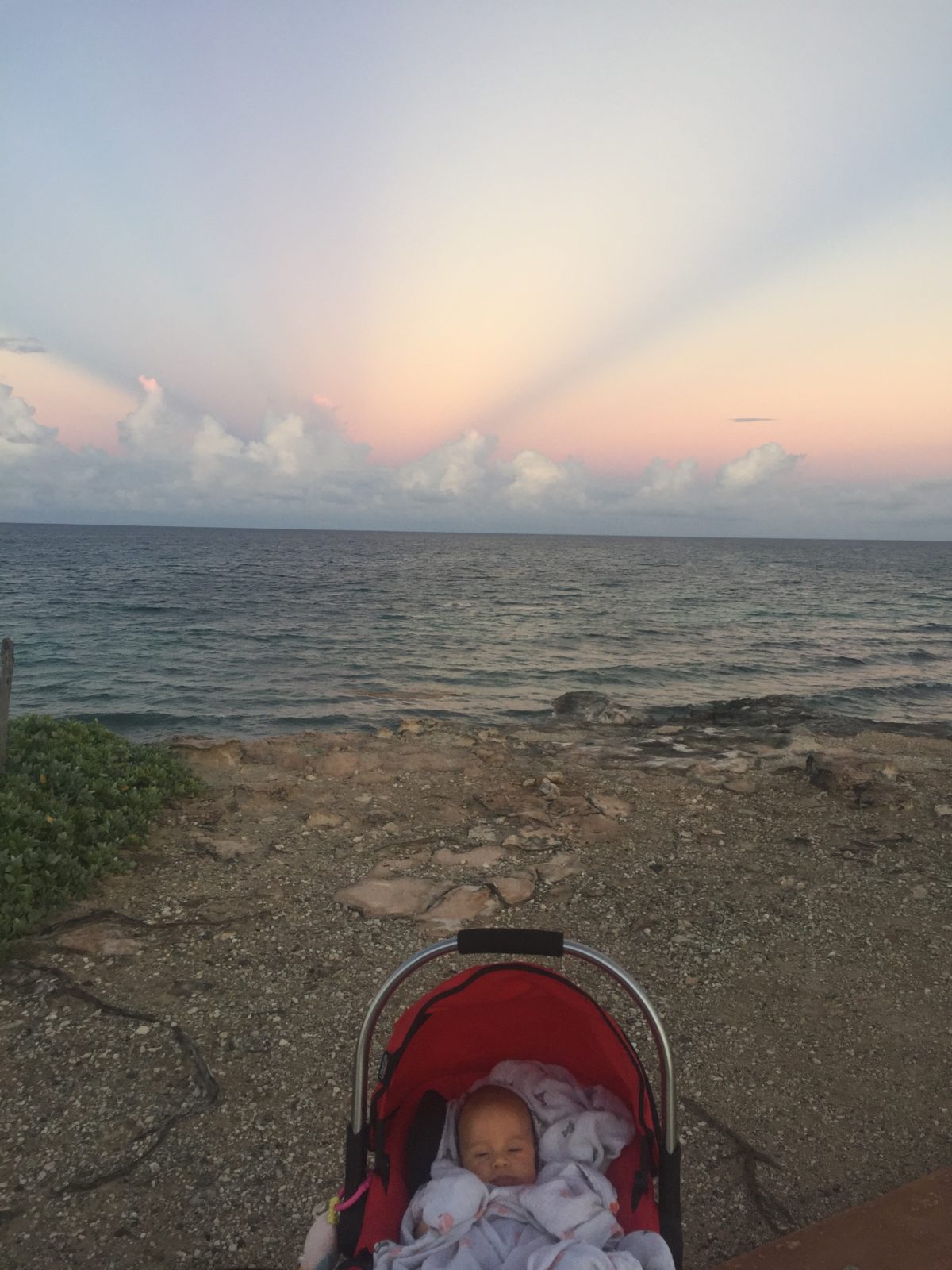 Baby Callan and an Isla Mujeres sunset.